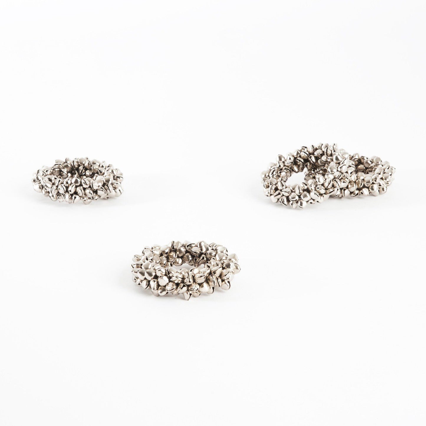 Fennco Styles Petite Bell Napkin Rings, Set of 4 - Silver Jingle Bell Wreath Napkin Holders for Dining Room, Banquets, Family Gatherings, Holidays and Special Occasions