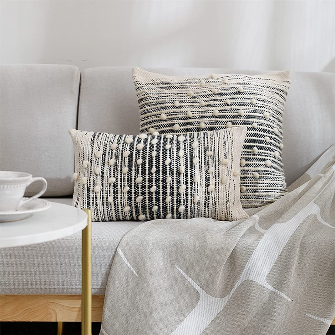 Fennco Styles Handwoven Striped Pom Pom Cotton Wool Decorative Throw Pillow 18" W x 18" L - Black & White Textured Cushion for Home, Couch, Bedroom, Living Room and Office Décor