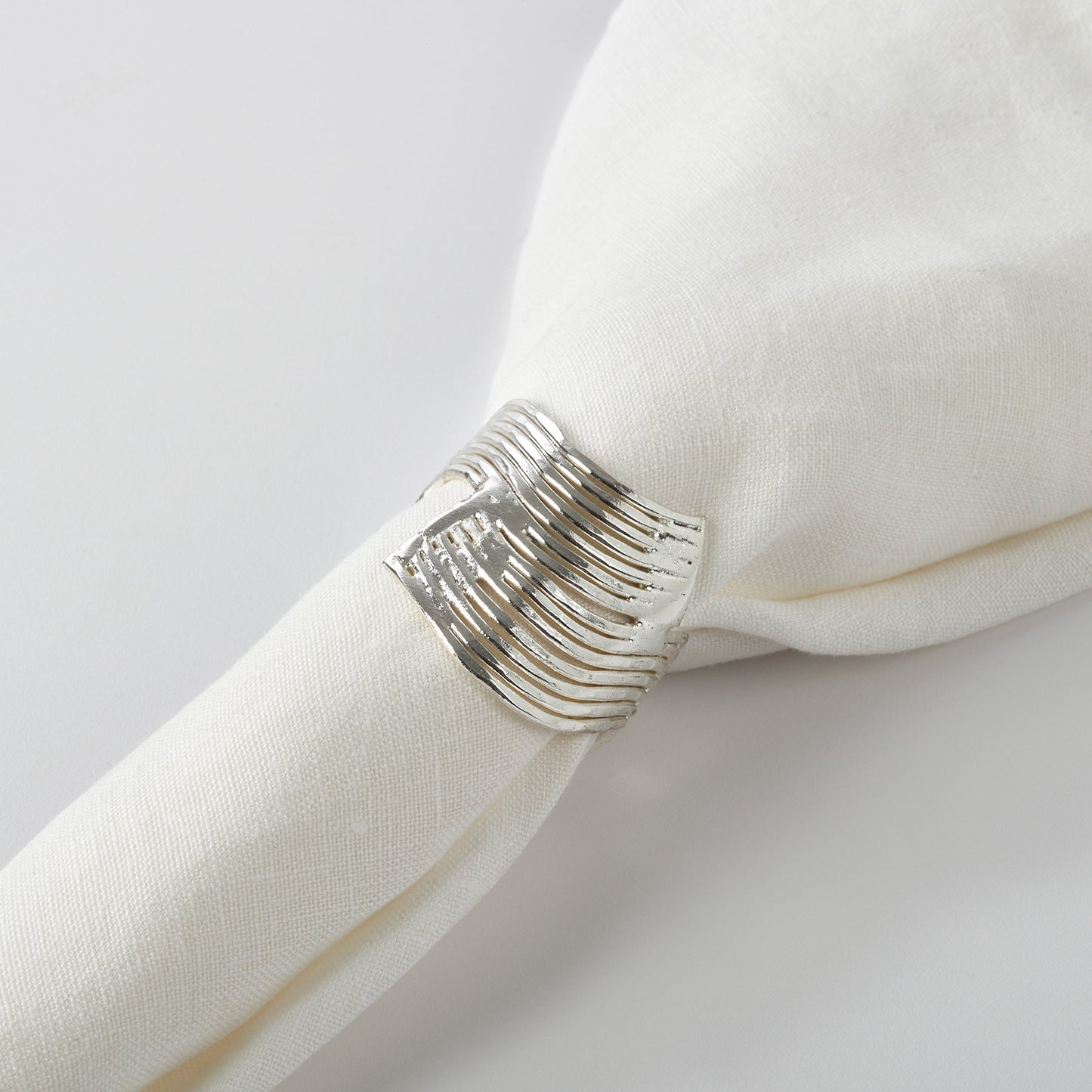 Fennco Styles Neptune Collection Wavy Design Metal Napkin Rings - Set of 4 - Silver