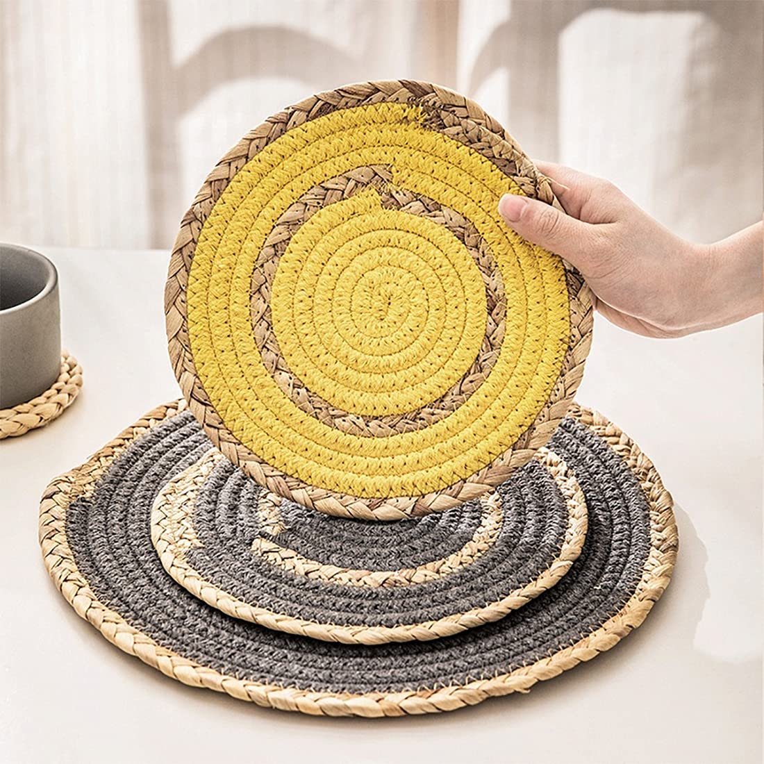 Fennco Styles Hand-Woven Rattan Cotton Rope Braided Placemats 12-Inch Round, Set of 4 - Heat Resistant Insulation Table Mats for Home, Boho Décor, Dining Table, Banquets and Special Events